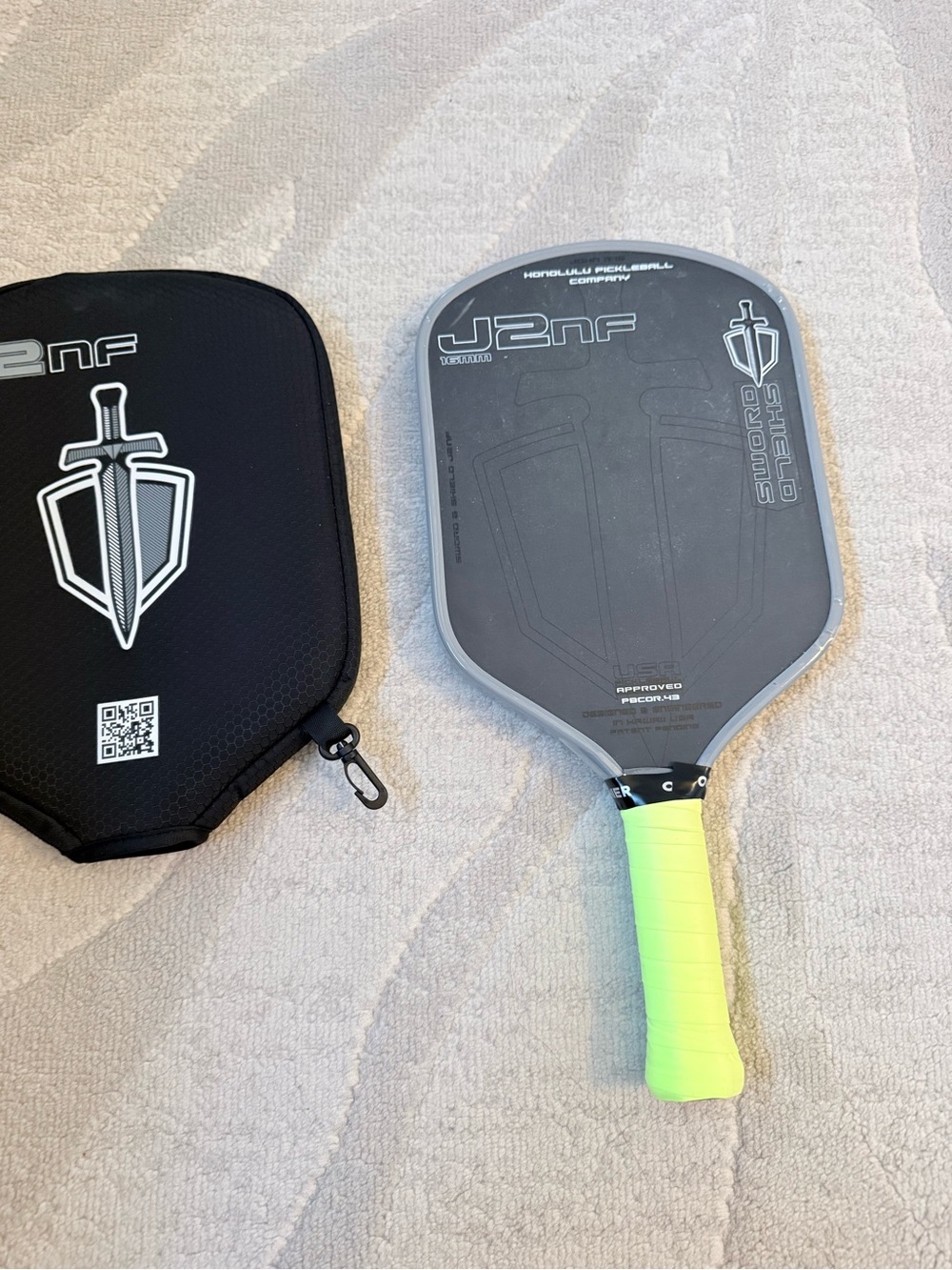 Like new - Honolulu J2nf pickleball paddle + brand new grip and guard
